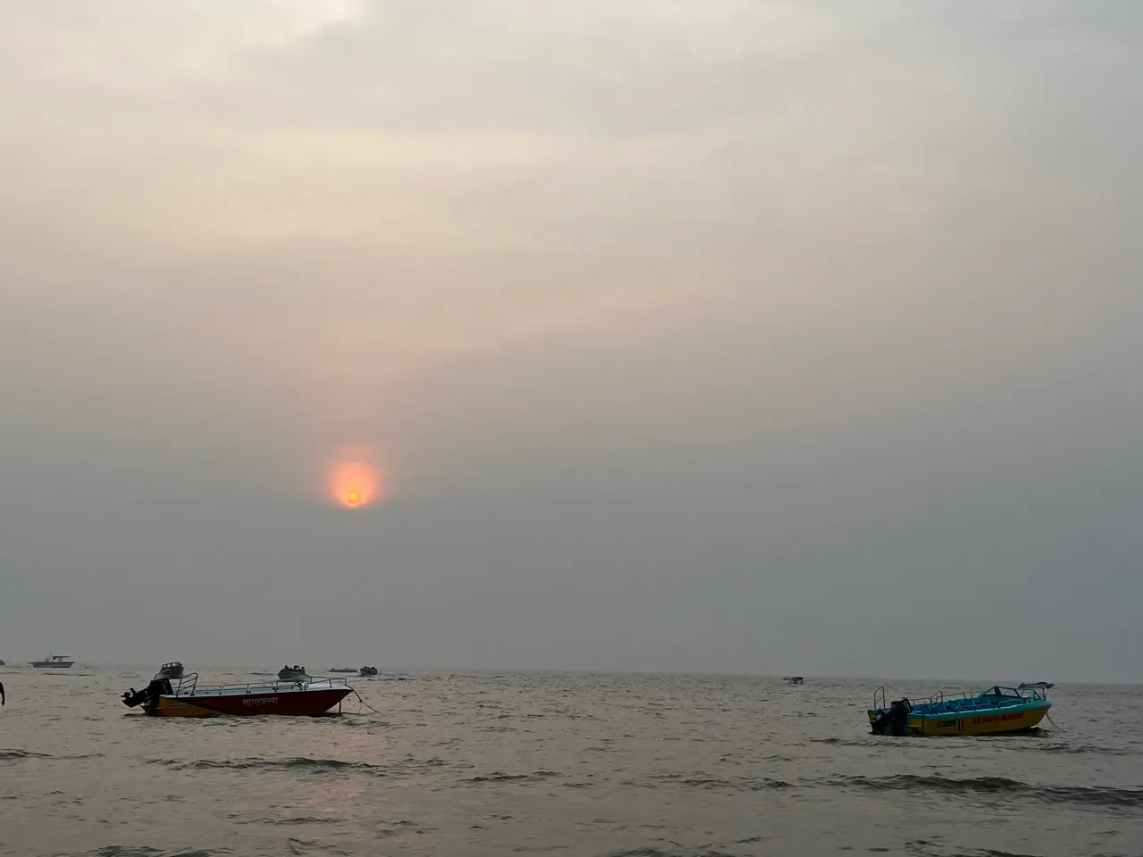 A hazy sun over the sea